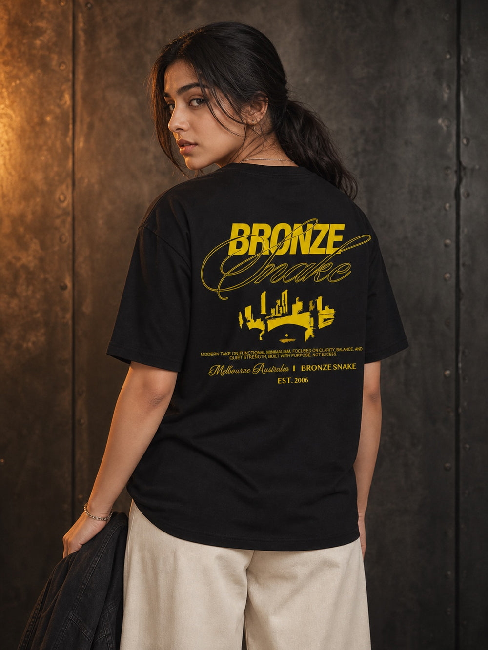 TEEVYBE Women’s Black Oversized T-Shirt with Bronze Snake Graphic Print