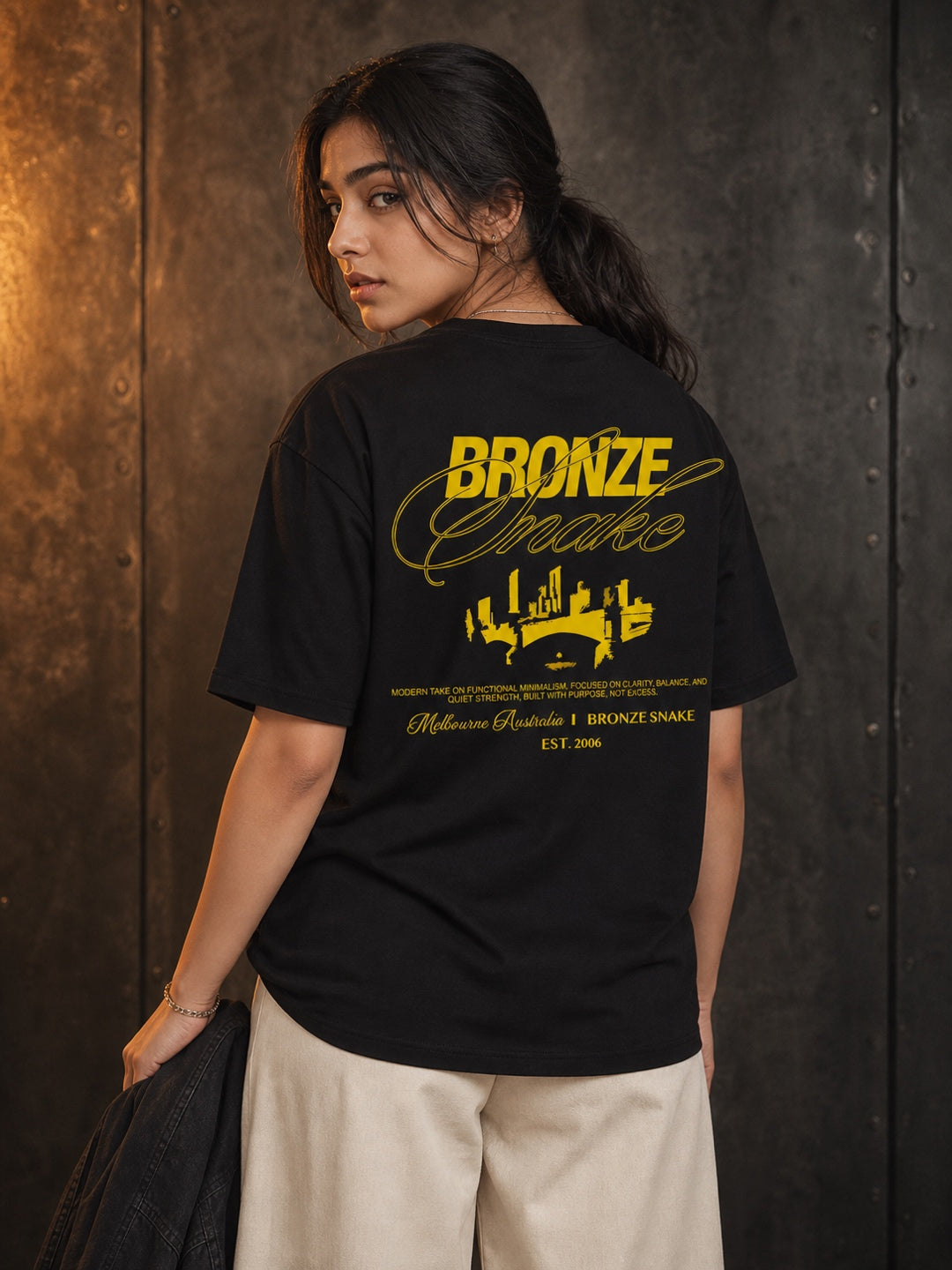 TEEVYBE Women’s Black Oversized T-Shirt with Bronze Snake Graphic Print