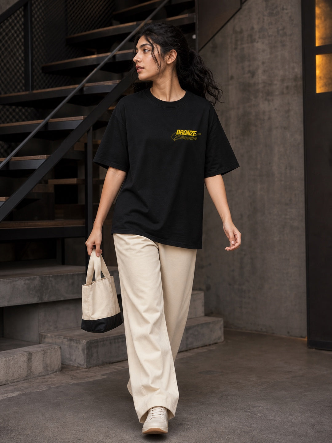 TEEVYBE Women’s Black Oversized T-Shirt with Bronze Snake Graphic Print