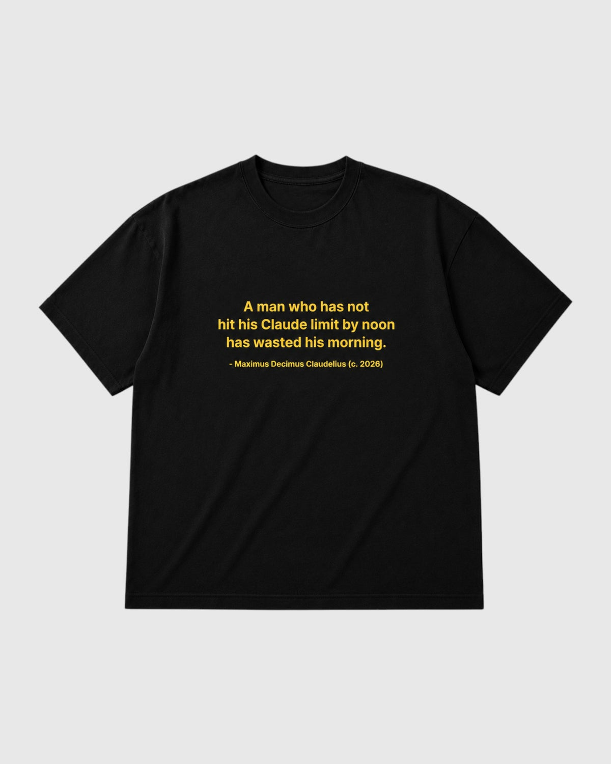 A black short-sleeve crewneck t-shirt with a yellow printed quote on the chest, displayed flat against a light gray background.